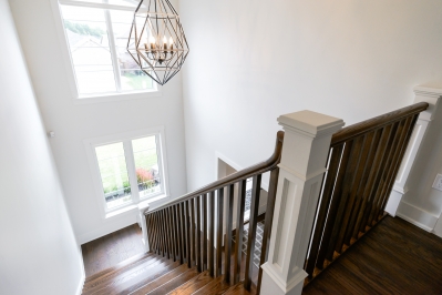 Designs by Santy :: Euro Home Staircase with high window and chandelier