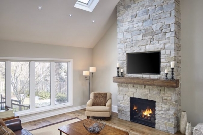 Designs by Santy :: Chalet Revitalization Loft ceiling with skylight and stone fireplace