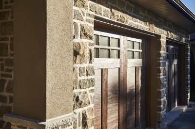 Designs by Santy :: Royal Revival Wood panel garage with stone and stucco