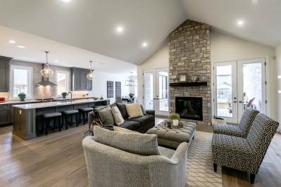 Designs by Santy :: Transitional Bungalow Living room with stone fireplace and vaulted ceiling