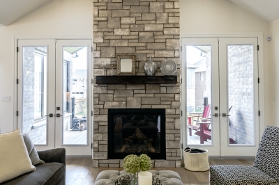 Designs by Santy :: Transitional Bungalow Fireplace sitting area with view to porch