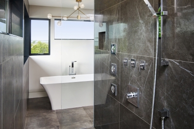 Designs by Santy :: Modern Prairie ensuite with walk-through shower and free-standing bathtub