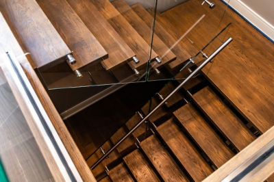 Designs by Santy :: Modern Lakehouse Wood staircase with glass railing