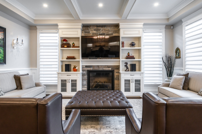 Designs by Santy :: Traditional Luxury Great room with stone fireplace, millwork and coffered ceiling