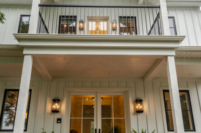 Designs by Santy :: Coastal Farmhouse Grand entry with double doors, sconces balcony and white stained lumber