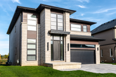Designs by Santy :: Modern Pilaster Home Front exterior with modern pilasters, flat roof entry and vertical sconces
