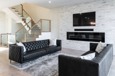 Designs by Santy :: Modern Pilaster Home Sitting area with modern fireplace and staircase with glass rail