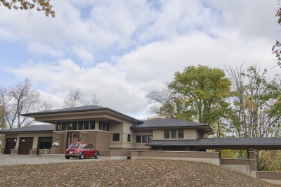 Designs by Santy :: Riverhouse Front elevation with prairie style roof