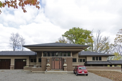 Designs by Santy :: Riverhouse Front elevation with stucco and brick